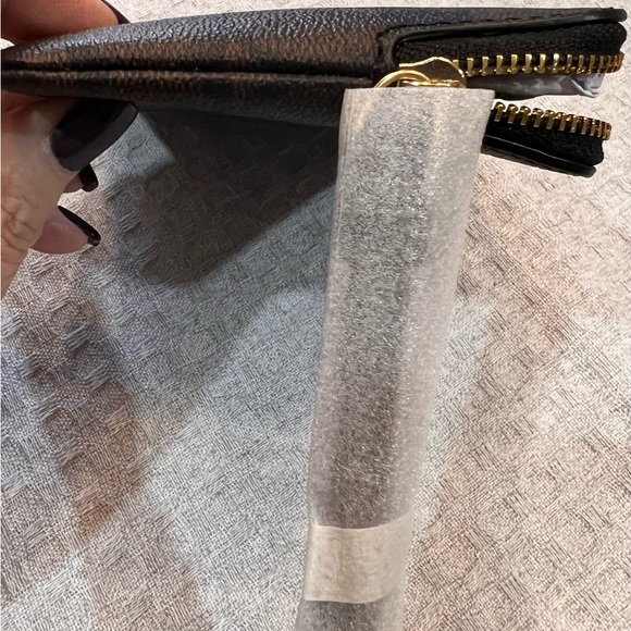 Gorgeous, NWT, black/brown COACH Signature “C” PVC Leather corner zip wristlet - Picture 11 of 15